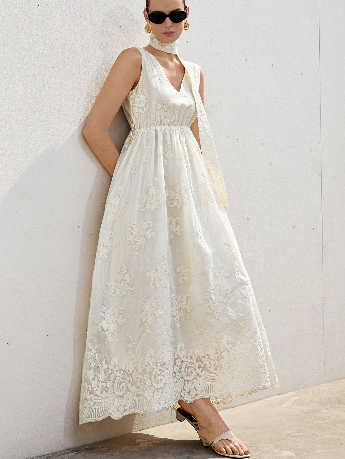 Step into romance with this elegant full-length dress featuring charming 3D embroidery and a flattering sash tie. Its delicate details and flowing silhouette make it the perfect choice for dreamy vacations and special moments. Feel confident and effortlessly stylish wherever your adventures take you!