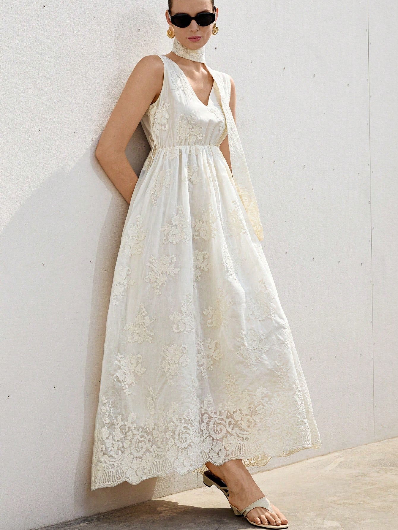 Step into romance with this elegant full-length dress featuring charming 3D embroidery and a flattering sash tie. Its delicate details and flowing silhouette make it the perfect choice for dreamy vacations and special moments. Feel confident and effortlessly stylish wherever your adventures take you!