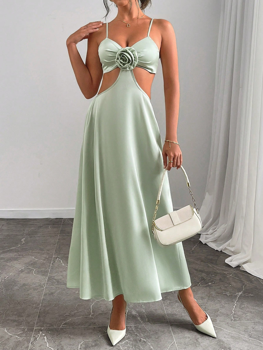 This Elegant 3D Floral Contrast Color Sleeveless Slip Dress for Women is designed for the stylish and sophisticated woman. Crafted with intricate 3D floral detailing and a striking contrast color, this dress exudes elegance and femininity. The sleeveless design adds a touch of sophistication, making it perfect for any special occasion.