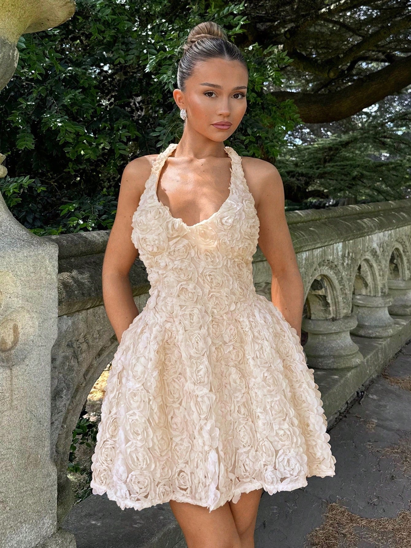 Step into the spotlight in this show-stopping champagne halter neck dress! Featuring stunning 3D floral embellishments that add dimension and drama, this short dress is your go-to for weddings, cocktail parties, and unforgettable nights out. The flattering halter neckline frames your shoulders beautifully while the delicate florals catch every light. Whether you're dancing the night away or making a grand entrance, this dress delivers elegance with a fun, flirty twist. Slip it on and watch heads turn!