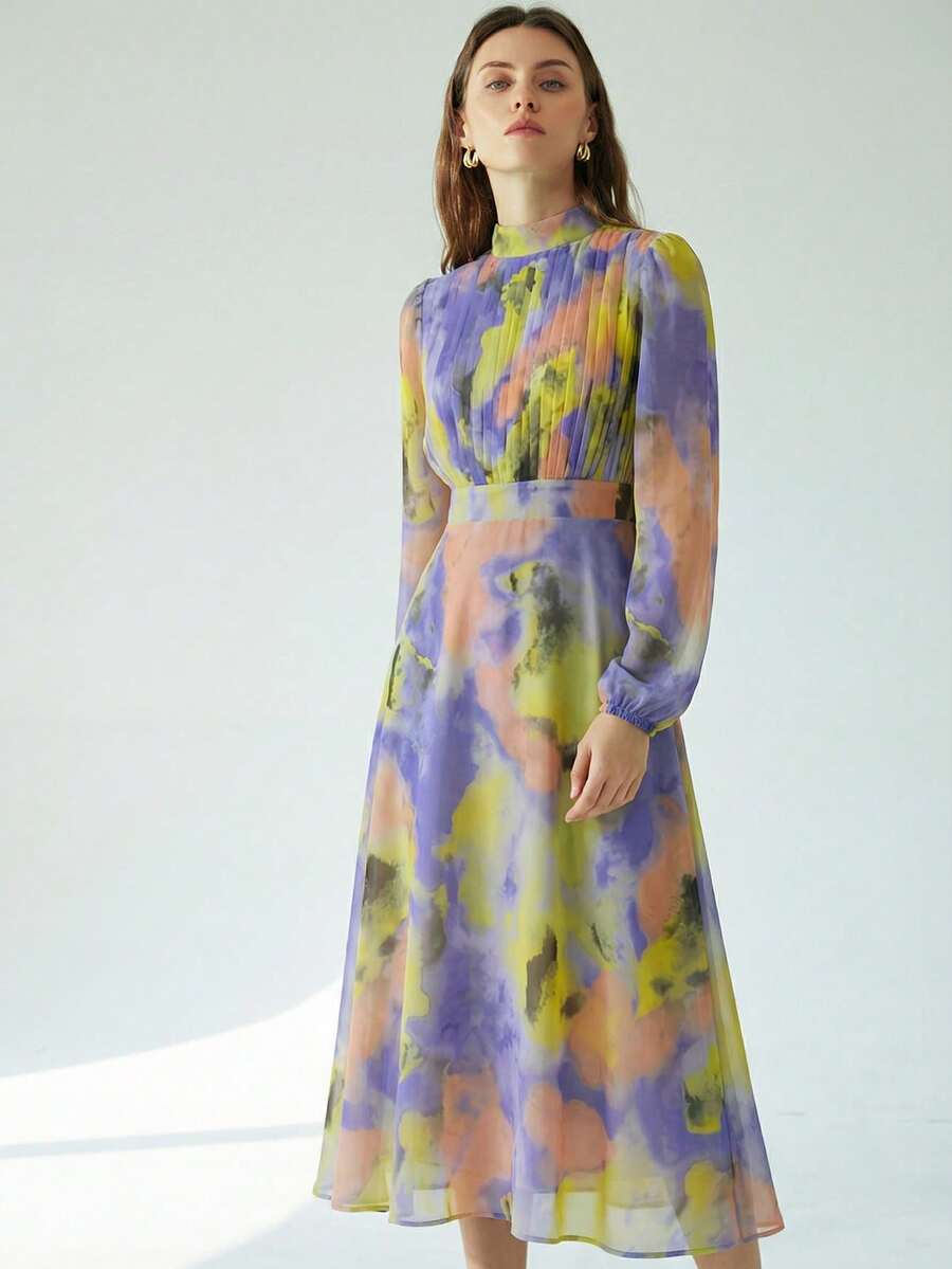 Capture the essence of timeless romance with this elegant A-line midi dress, featuring a sophisticated pleated front and graceful lantern sleeves that evoke a classic retro French aesthetic. Crafted from lightweight blue floral chiffon, the delicate botanical print and flowing silhouette create an ethereal movement perfect for garden parties or romantic strolls. The cinched waist and modest midi length offer a flattering fit for all figures, while the sheer textured fabric adds a touch of vintage-inspired l