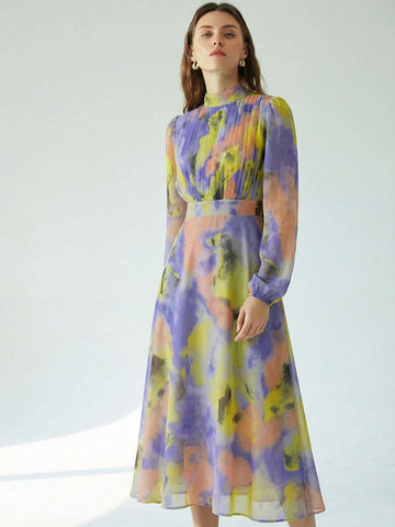 Capture the essence of timeless romance with this elegant A-line midi dress, featuring a sophisticated pleated front and graceful lantern sleeves that evoke a classic retro French aesthetic. Crafted from lightweight blue floral chiffon, the delicate botanical print and flowing silhouette create an ethereal movement perfect for garden parties or romantic strolls. The cinched waist and modest midi length offer a flattering fit for all figures, while the sheer textured fabric adds a touch of vintage-inspired l