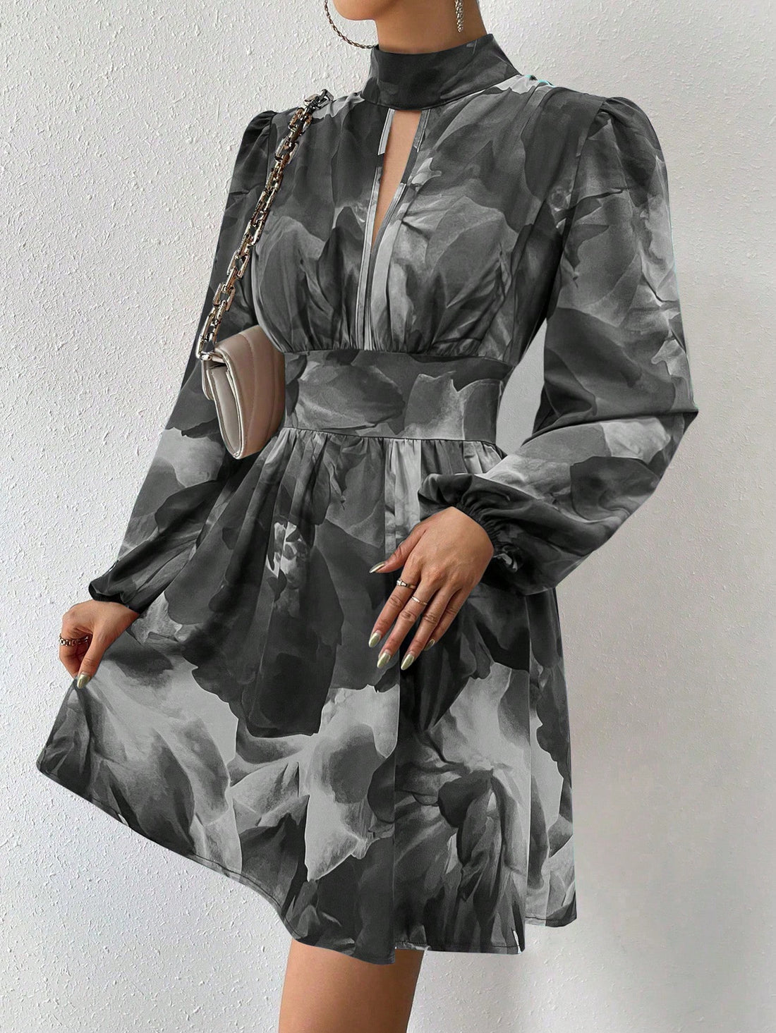 Get ready to turn heads with our Elegant All-Over Print Long Sleeve Dress! With a stylish keyhole neck and intricate hollow out detail, this dress is perfect for any occasion. The all-over print adds a pop of personality to this already stunning dress. You'll be the talk of the town every time you wear it!