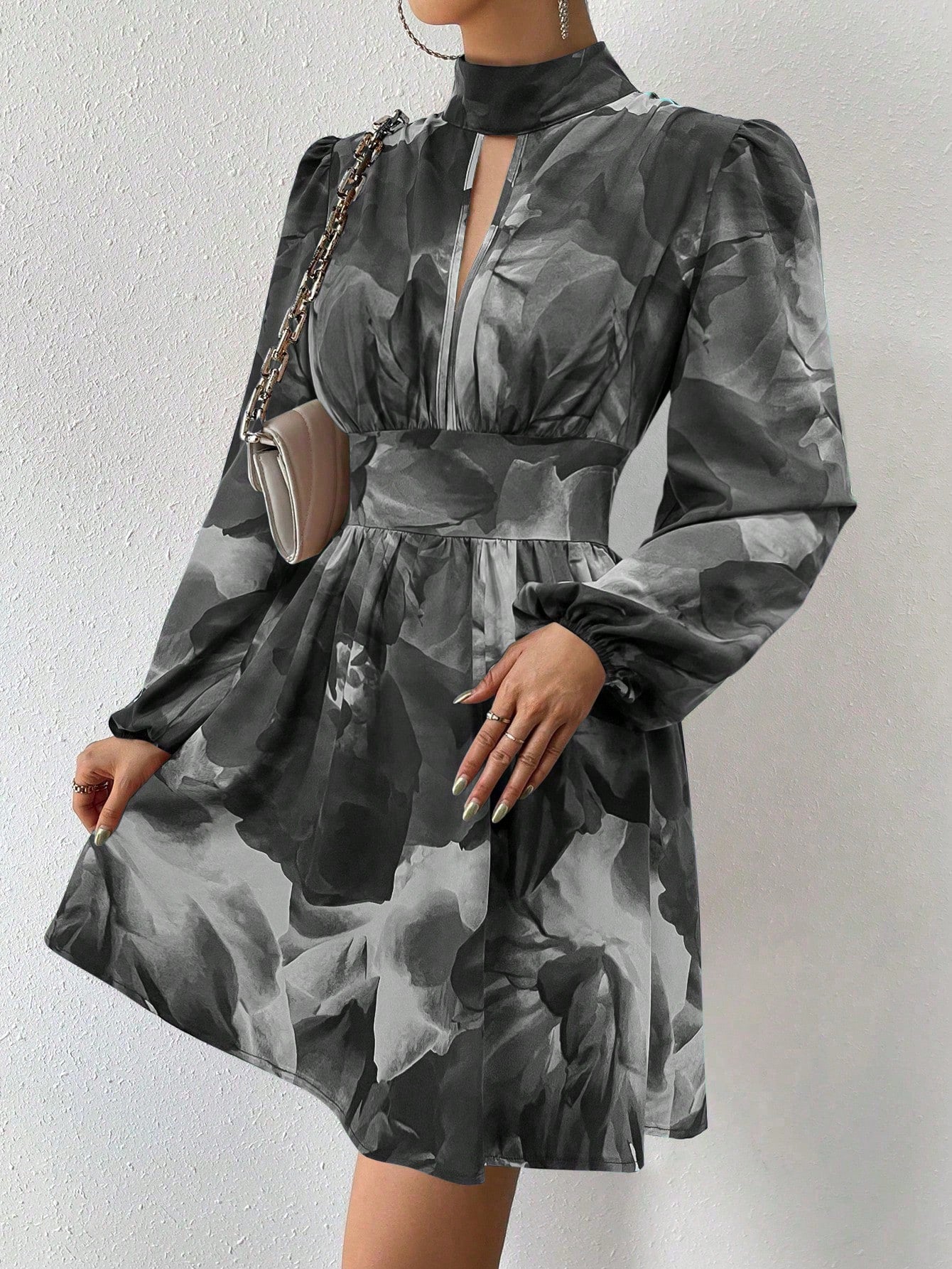 Get ready to turn heads with our Elegant All-Over Print Long Sleeve Dress! With a stylish keyhole neck and intricate hollow out detail, this dress is perfect for any occasion. The all-over print adds a pop of personality to this already stunning dress. You'll be the talk of the town every time you wear it!