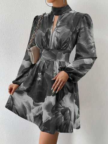 Get ready to turn heads with our Elegant All-Over Print Long Sleeve Dress! With a stylish keyhole neck and intricate hollow out detail, this dress is perfect for any occasion. The all-over print adds a pop of personality to this already stunning dress. You'll be the talk of the town every time you wear it!
