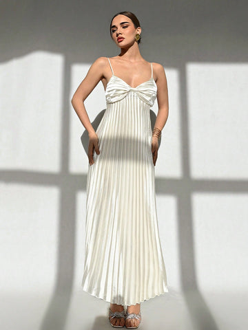 Step into the spotlight with this Elegant Apricot Pleated Long Strap Dress, perfect for weddings and bridesmaid parties. Its flowing pleats add a touch of whimsy, while the soft apricot hue keeps things sweet and stylish. The long straps provide a graceful silhouette that moves effortlessly with you—get ready to twirl, dance, and make unforgettable memories in this charming dress!