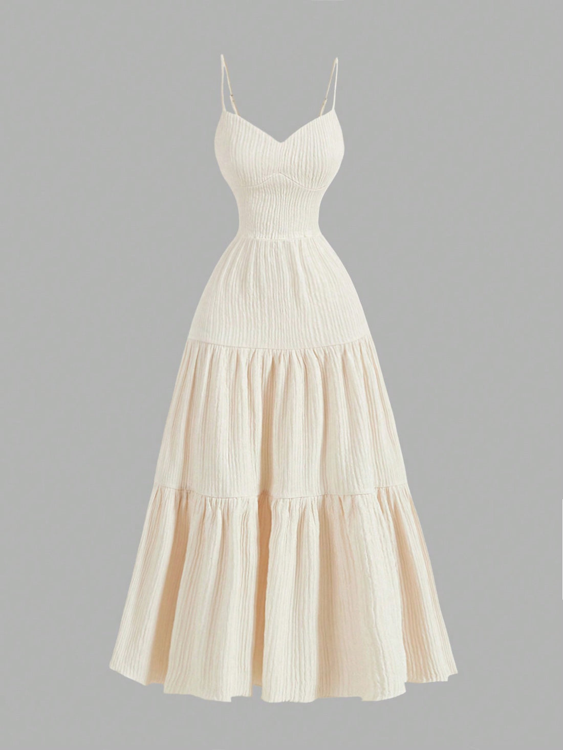 Get ready to be the belle of the New Year's ball with our Elegant Apricot Spaghetti Strap Tiered Ruffle Dress! With its delicate ruffles and flattering spaghetti straps, you'll be turning heads all night long. Perfect for any celebration, this dress will have you feeling confident and stylish. Don't miss out on the fun, grab yours today!