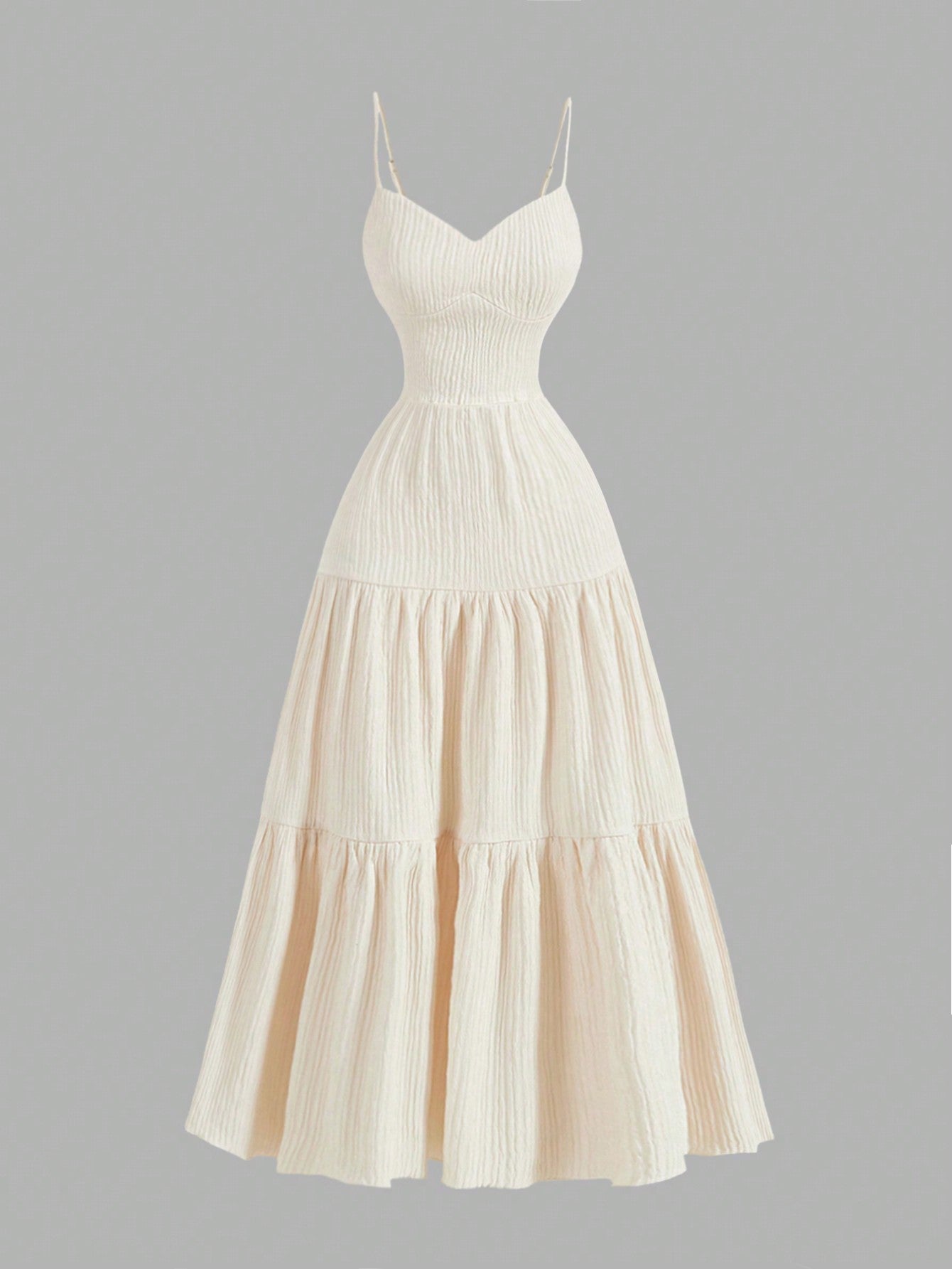 Get ready to be the belle of the New Year's ball with our Elegant Apricot Spaghetti Strap Tiered Ruffle Dress! With its delicate ruffles and flattering spaghetti straps, you'll be turning heads all night long. Perfect for any celebration, this dress will have you feeling confident and stylish. Don't miss out on the fun, grab yours today!