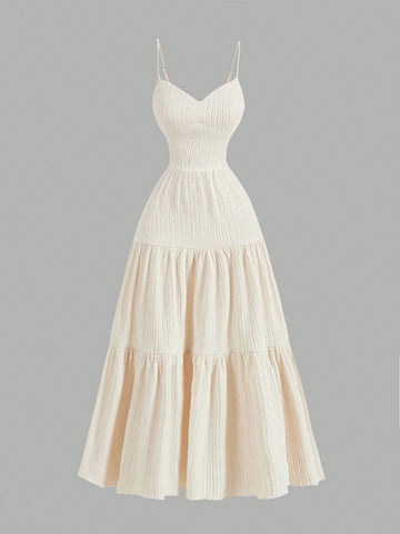 Get ready to be the belle of the New Year's ball with our Elegant Apricot Spaghetti Strap Tiered Ruffle Dress! With its delicate ruffles and flattering spaghetti straps, you'll be turning heads all night long. Perfect for any celebration, this dress will have you feeling confident and stylish. Don't miss out on the fun, grab yours today!