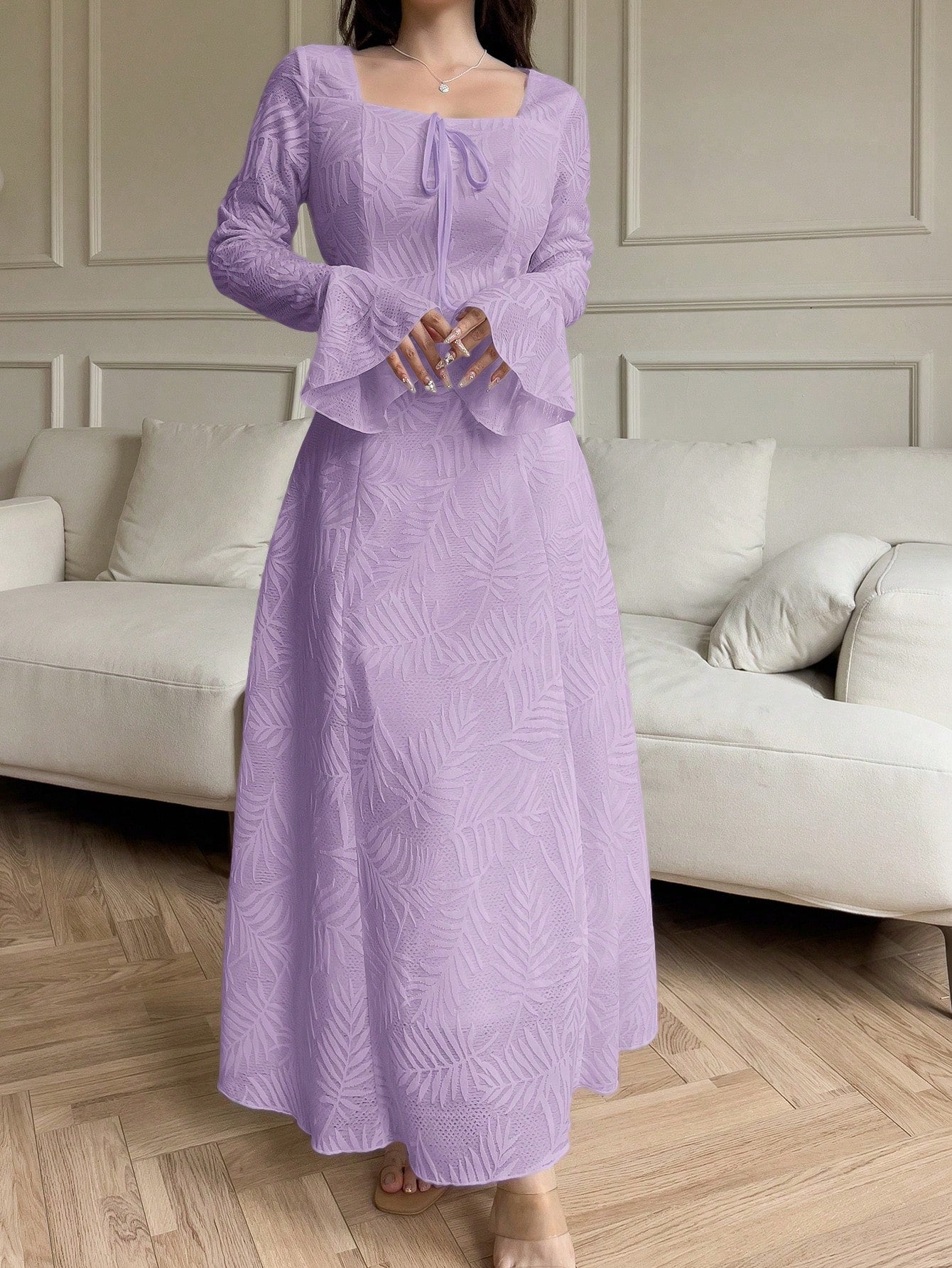 Embrace your inner tropical goddess with this playful Arabic-style dress! The vibrant floral pattern dances across long sleeves while the flirty V-neck and tie-front detail add just the right touch of feminine charm. Perfect for turning heads at summer soirées or adding a splash of sunshine to your everyday wardrobe.