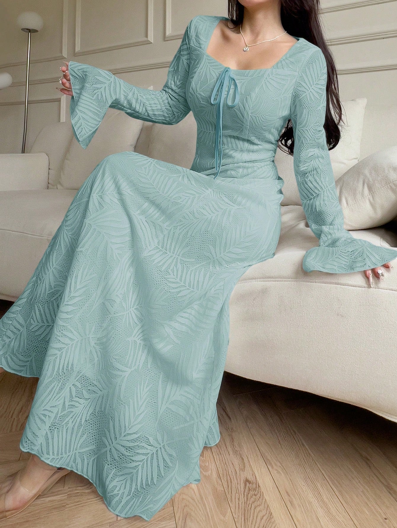 Unleash your inner fashionista with our Elegant Arabic Style V-Neck Long Sleeve Dress. With a front tie and stunning floral print, this dress adds a touch of sophistication to your wardrobe. Perfect for any occasion, you'll feel confident and stylish wherever you go.