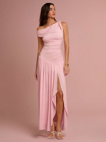 Get ready to turn heads and make a statement with our Elegant Asymmetric Neck High-Slit Dress. Perfect for summer vacations and evening dates, this dress is designed to be both stylish and comfortable. Show off your unique sense of style with the elegant asymmetric neck and high-slit design. Let this dress be your go-to for any special occasion.