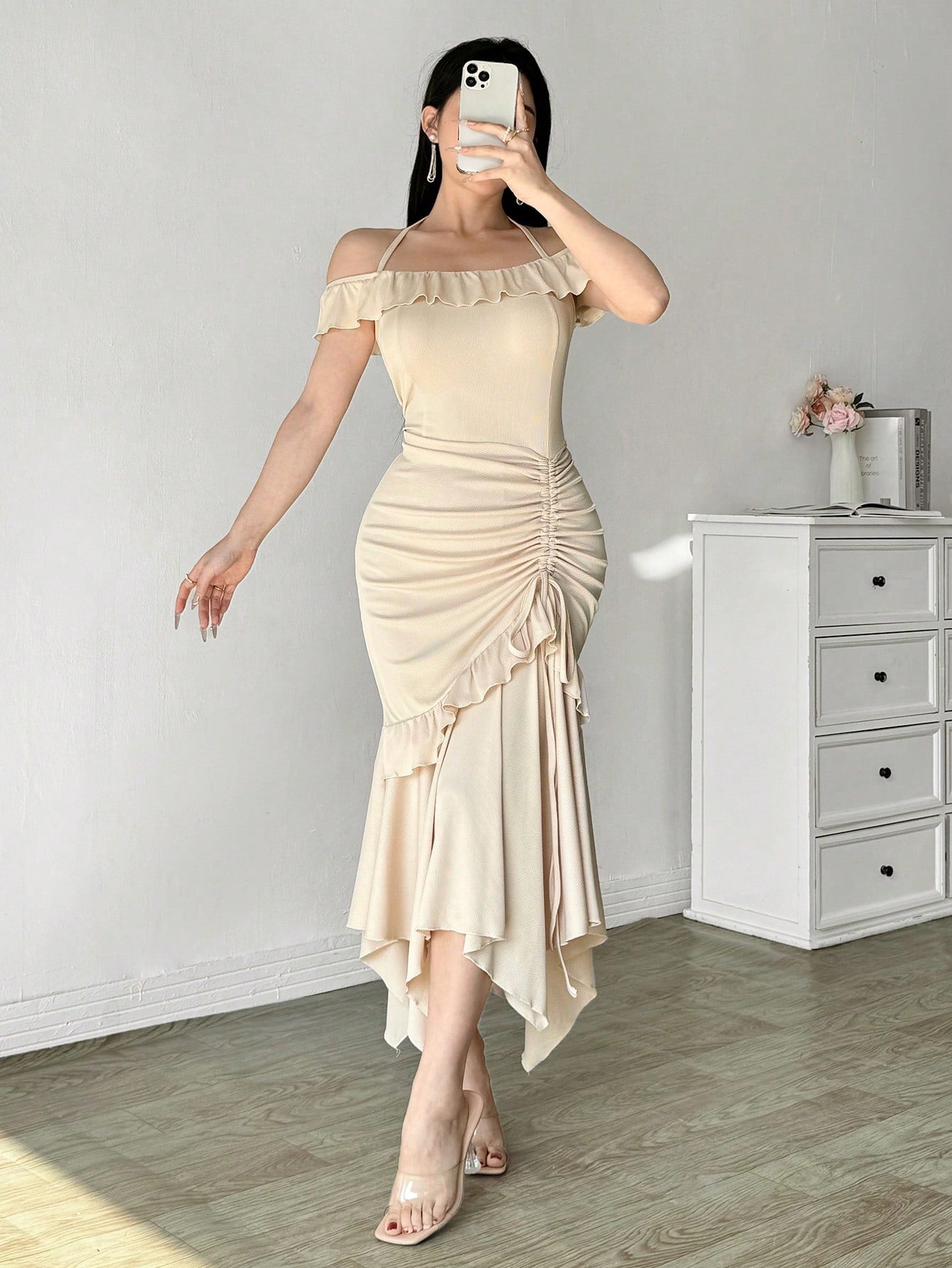 Unleash your unique style with our Elegant Asymmetrical Hem Dress! This dress features an asymmetrical hem, ruched waist, and ruffle trim, adding an elegant touch to any outfit. With its eye-catching design, you'll stand out from the crowd and feel confident all day long. Perfect for any occasion, this dress will make you the center of attention.