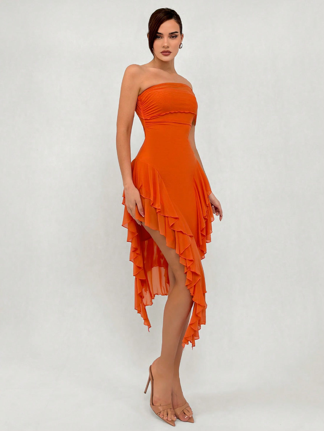 Turn heads on your next romantic outing in this stunning asymmetrical neck long dress. The graceful slit and delicate ruffle details add just the right amount of flirtation, while the elegant silhouette keeps things sophisticated. Perfect for date nights, special occasions, or whenever you want to feel absolutely fabulous. This dress strikes that magical balance between timeless elegance and modern edge—because who says you can't be both classy and playful?