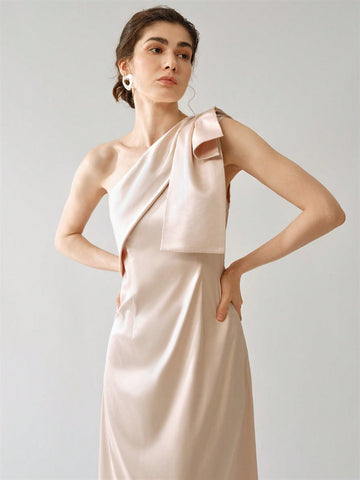 Introducing the perfect outfit for wedding guests - our Elegant Asymmetrical Shoulder Bowknot Long Dress! Featuring a unique asymmetrical shoulder design and a charming bowknot detail, this dress is sure to make a statement. Comfortable and fashionable, it's a must-have for any special occasion.