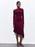 Turn heads with this playful yet sophisticated wine-colored dress featuring an asymmetrical shoulder design and flattering ruched details. Its mid-length cut offers just the right balance of elegance and fun, perfect for any occasion that calls for a touch of flair. Feel confident and effortlessly chic while enjoying the unique silhouette that adds a dash of whimsy to your wardrobe.