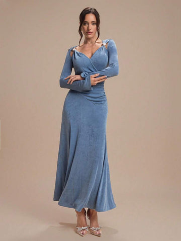 Elevate your everyday style with this chic asymmetrical V-neck dress that's equal parts sophisticated and fun. The sleek metal buckle detail adds an unexpected edge, while the flattering cut works beautifully for casual outings, weekend brunches, or dressed-up evenings. Versatile enough to pair with sneakers or heels, this dress is your new go-to piece for looking effortlessly put-together. Perfect for anyone who loves a little personality in their wardrobe!