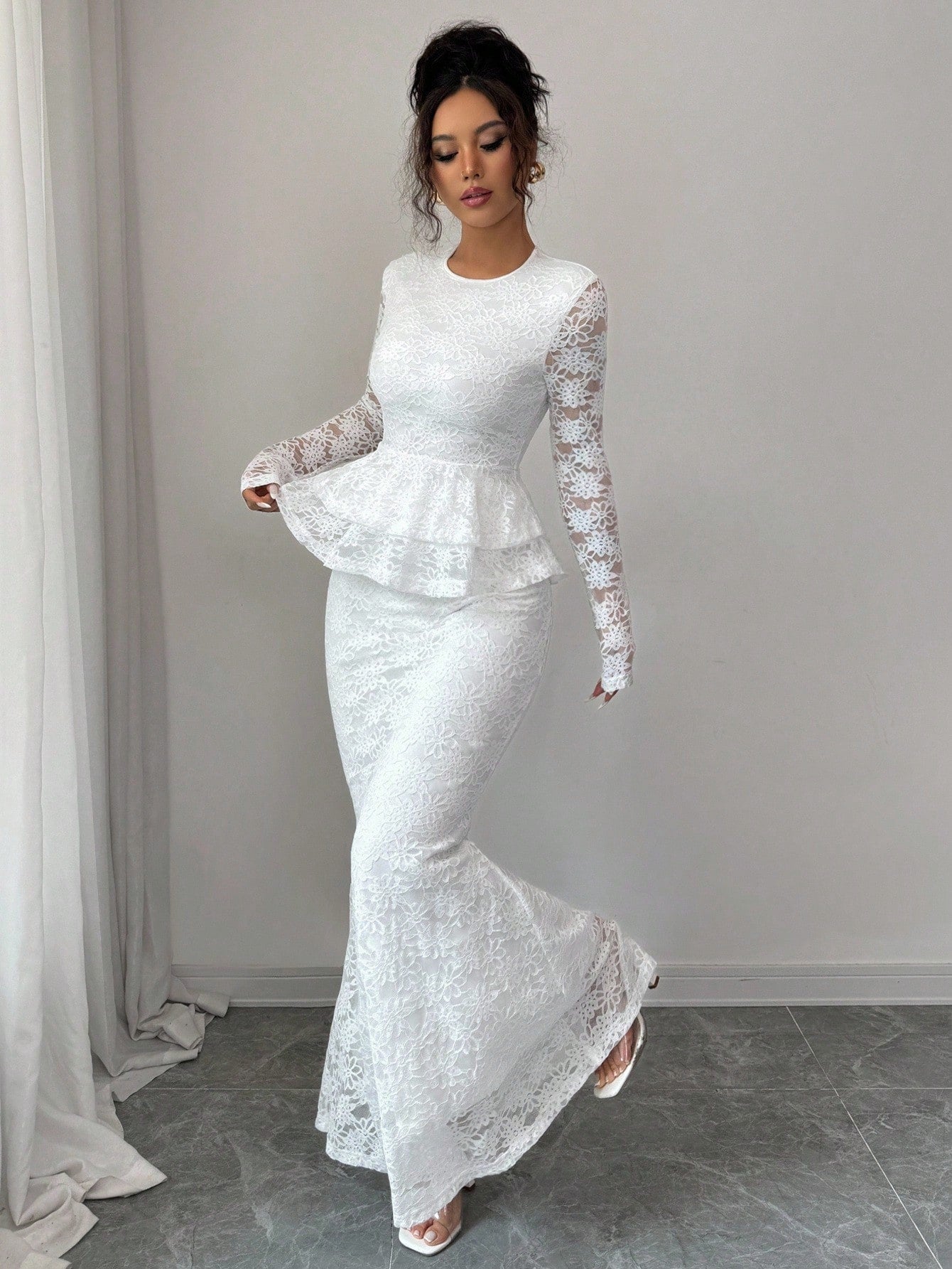 Elevate your autumn wardrobe with this stunning two-piece set that's pure romance. The delicate lace mesh top drapes beautifully, creating an effortlessly chic silhouette, while the bodycon mermaid skirt hugs your curves in all the right ways. Whether you're heading out on a special date or turning heads at fall gatherings, this ensemble delivers sophisticated style with a flirty edge. The perfect blend of elegance and confidence—because looking fabulous should feel as good as it looks.