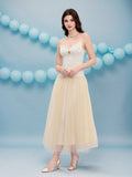 Make a statement at your next special event in this stunning backless formal gown that perfectly balances sophistication with modern flair. The halter neckline provides elegant support while the daring open back creates an unforgettable silhouette. Delicate mesh splicing adds a playful touch of intrigue, letting just enough skin peek through to keep things interesting. Whether you're attending a wedding, gala, or celebration, this dress transforms you into the most captivating guest in the room. Slip into c