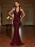 Turn heads at every event with this playful, Elegant Backless Halter Neck Floral Sequin Mermaid Prom Dress. Sparkling sequins and delicate floral details create a dazzling look, while the backless halter design adds a flirty, confident touch. The figure-hugging mermaid silhouette ensures you'll shine wherever you go, making every occasion unforgettable. Perfect for dancing the night away or stealing the spotlight with effortless charm.