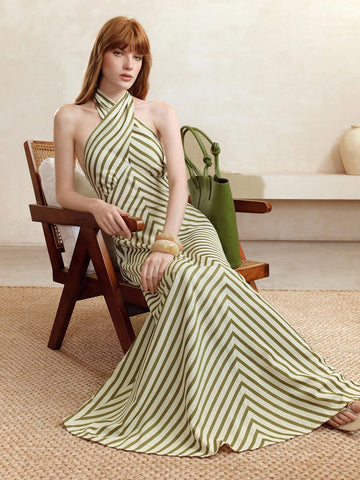 Turn heads wherever you go with this Elegant Backless Halter Neck Striped Dress. Designed to keep you cool and confident, its playful stripes and daring backless cut make it the ideal choice for holidays or any special occasion. Effortlessly stylish and flirty, this dress is your new go-to for stealing the spotlight with ease.