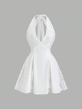 Front view of backless lace mini dress for elegant party moments