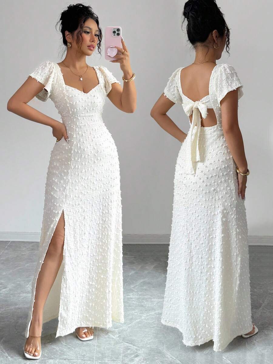 Experience the breathtaking fusion of romantic heritage and sharp, modern architectural tailoring. This stunning bowknot-accented ensemble is meticulously designed for the woman who values a high-fashion, "quiet luxury" approach to seasonal dressing—the ultimate centerpiece for prestigious coastal retreats, exclusive candlelit soirées, and high-authority summer dates.