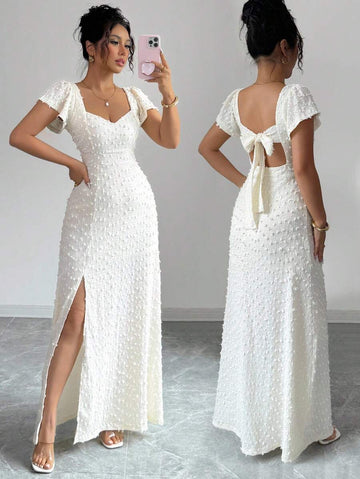 Experience the breathtaking fusion of romantic heritage and sharp, modern architectural tailoring. This stunning bowknot-accented ensemble is meticulously designed for the woman who values a high-fashion, "quiet luxury" approach to seasonal dressing—the ultimate centerpiece for prestigious coastal retreats, exclusive candlelit soirées, and high-authority summer dates.
