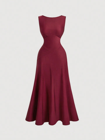This stunning wine red evening dress is backless and features a unique bow tie detail, adding an elegant touch to any event. The open back design adds a touch of allure while the bow tie detail adds a playful touch. Perfect for a night out or special occasion.