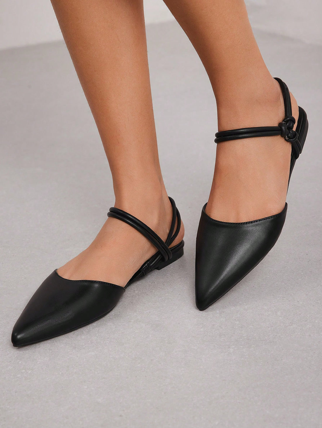 Elevate your professional style with Elegant Basics Ankle Strap Pointed Toe Flat Shoes. Designed for business chic women, these elegant flats feature a pointed toe and ankle strap for a sophisticated look. Perfect for the office or a formal event, these shoes offer both fashion and comfort.