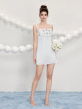 Slip into sophistication with this stunning beaded mini cocktail dress—your secret weapon for turning heads at weddings and special events. Intricate beadwork catches the light beautifully, creating an eye-catching shimmer that demands attention. The flattering mini silhouette strikes the perfect balance between chic and flirty, while the elegant design ensures you'll feel confident and fabulous from cocktail hour through the dance floor. Whether you're celebrating a milestone or attending an upscale gather