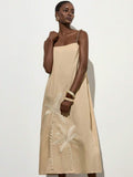 Step into vacation mode with this Elegant Beige Dress, featuring charming coconut tree embroidery and delicate straps. Perfect for sunny days and casual luxury, it blends comfort with a playful tropical vibe. Whether you're strolling the beach or sipping cocktails, this dress adds a breezy, stylish touch to your getaway wardrobe.