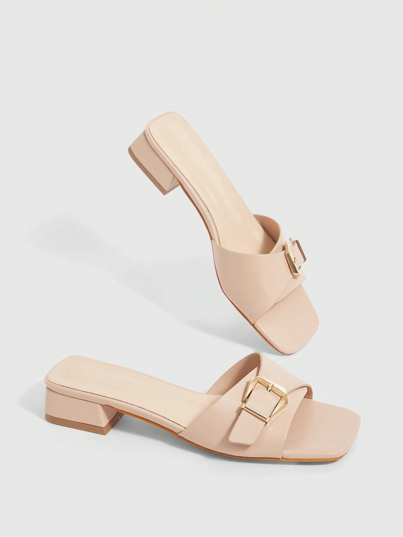 Step into style with these Elegant Beige Flat Sandals, perfectly designed to add a chic touch to any outfit. Featuring sleek metal accents, these versatile open-toe slides keep things comfy and cool all day long. Whether you're brunching with friends or strolling through the city, they effortlessly blend fashion and ease for your sunny adventures.
