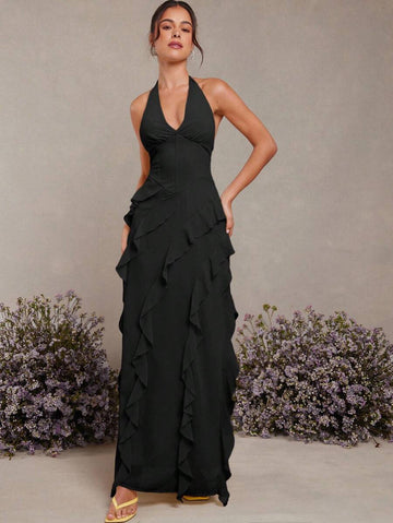 Step into summer romance with this Elegant Beige Halter Neck Maxi Dress. The ruffled neckline adds a flirty touch, while the flowing silhouette keeps you cool and comfortable all day long. Perfect for sunsets, garden parties, or carefree strolls, this dress combines effortless style with a playful vibe that’s sure to turn heads wherever you go.