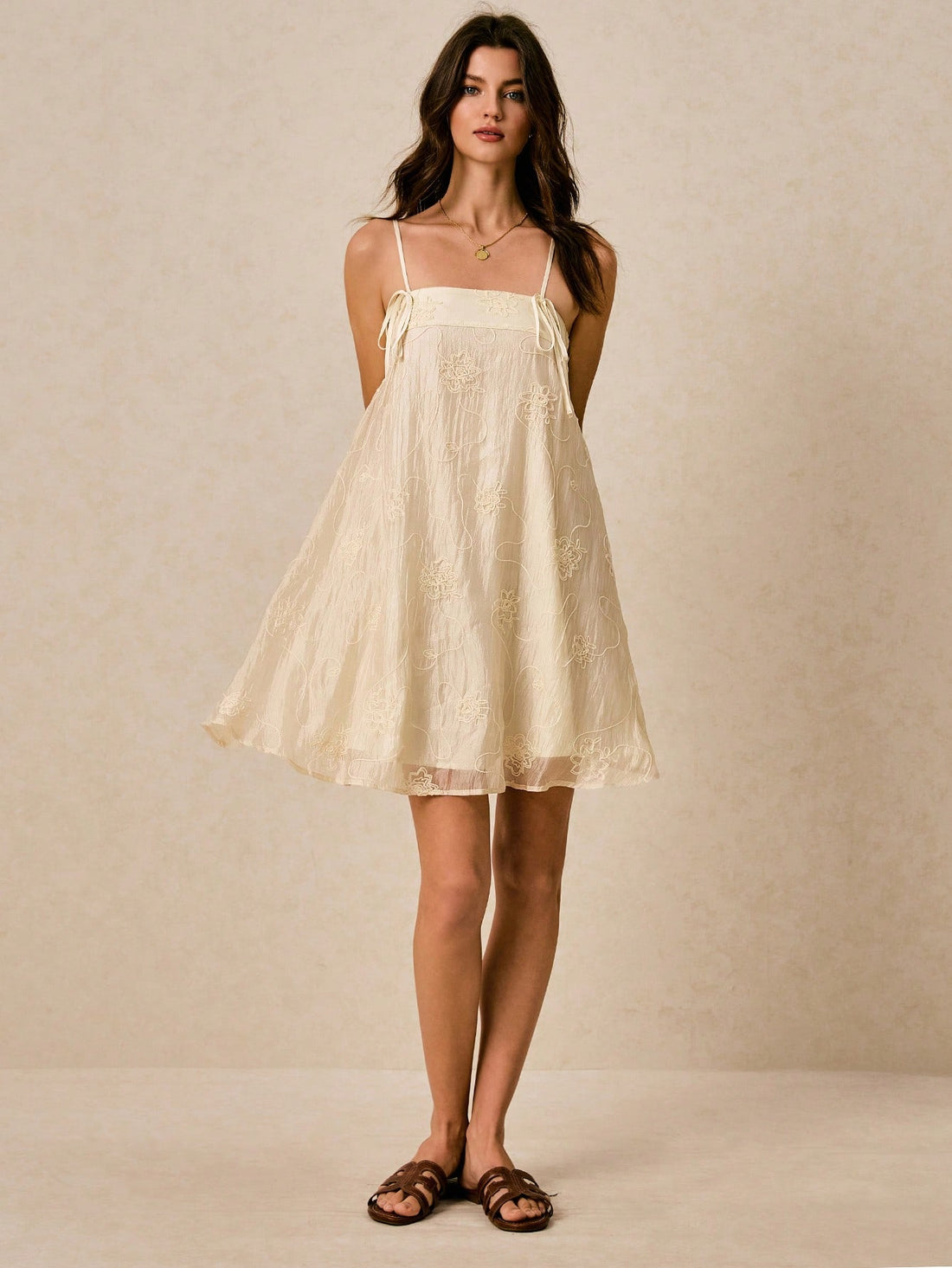 Step into sunshine with this Elegant Beige Halter Sundress, featuring charming 3D embroidery that adds a whimsical touch. Its breezy design keeps you cool and stylish, making it your go-to for summer weddings or lively festivals. Flirty and fun, this dress lets you dance the day away with effortless grace.