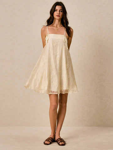 Step into sunshine with this Elegant Beige Halter Sundress, featuring charming 3D embroidery that adds a whimsical touch. Its breezy design keeps you cool and stylish, making it your go-to for summer weddings or lively festivals. Flirty and fun, this dress lets you dance the day away with effortless grace.