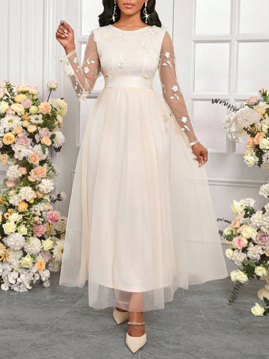 Get ready to turn heads with our Elegant Beige Lace Maxi Dress! Featuring a stunning three-dimensional flower patchwork, this dress is perfect for any occasion - from weddings to work and every season in between. Stand out with this unique and beautiful piece.