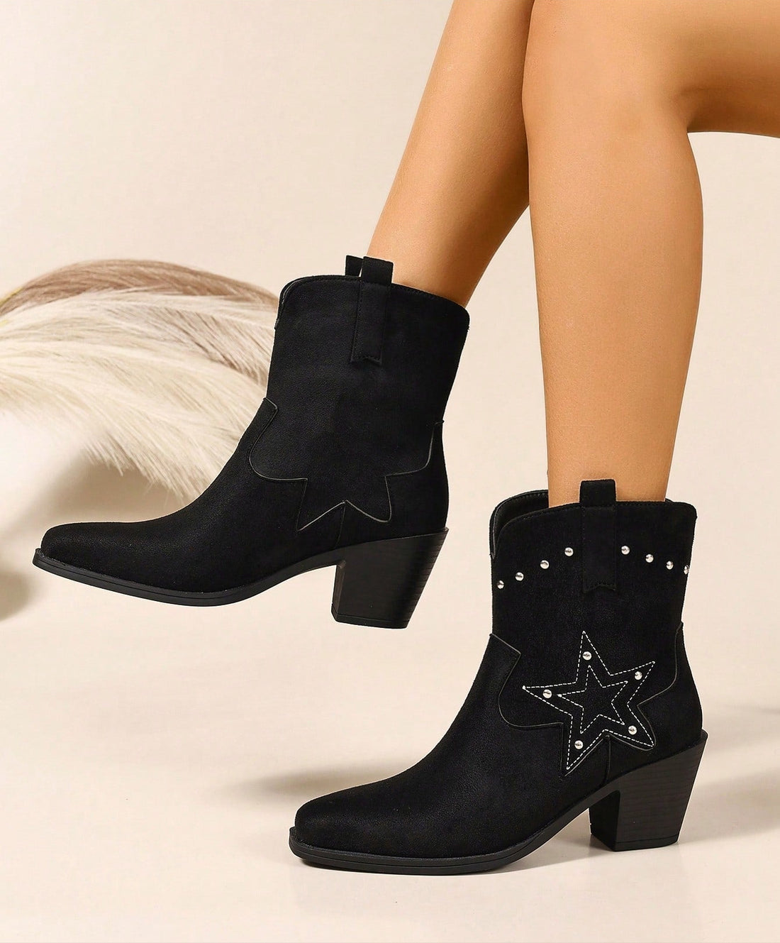 Step out in style with these Elegant Black Embroidered Chunky Heel Chelsea Boots. Perfect for vacation adventures, their bold chunky heel adds confidence while the intricate embroidery brings a touch of playful charm. Easy to slip on and versatile enough to pair with any outfit, these boots are your go-to for turning heads wherever you roam.