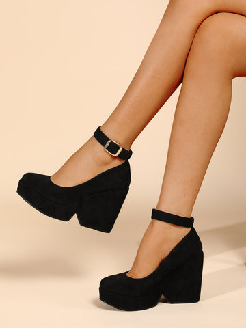 Step up your style with these Elegant Black Faux Suede Ankle Strap Wedge Court Shoes. Combining chic sophistication with comfy wedge heels, they add a playful edge to any outfit. The sleek solid black design and secure ankle strap make them perfect for everything from brunch dates to evening soirees. Feel confident, stylish, and ready to dance the night away!