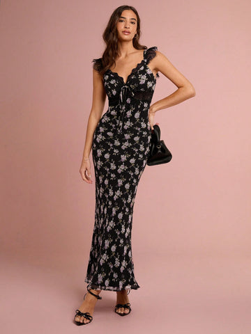 Dress to impress with our Elegant Black Floral Maxi Dress, perfect for summer occasions and romantic evenings. The stunning lace patchwork adds a touch of sophistication to this stylish and versatile piece. Make a statement and turn heads wherever you go!