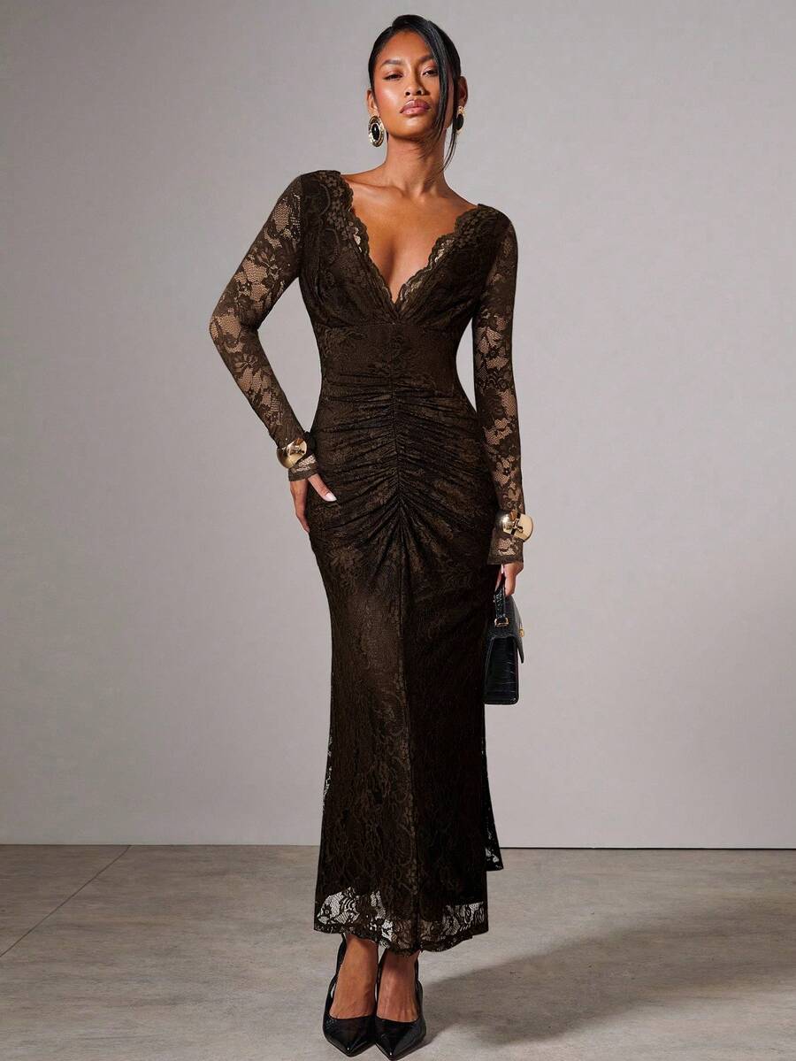 Experience the breathtaking fusion of neoclassical lace heritage and sharp, modern architectural tailoring. This stunning ruched ensemble is meticulously designed for the woman who values a high-fashion, "quiet luxury" approach to event dressing—the ultimate centerpiece for prestigious fall weddings, exclusive evening galas, and high-authority seasonal celebrations.