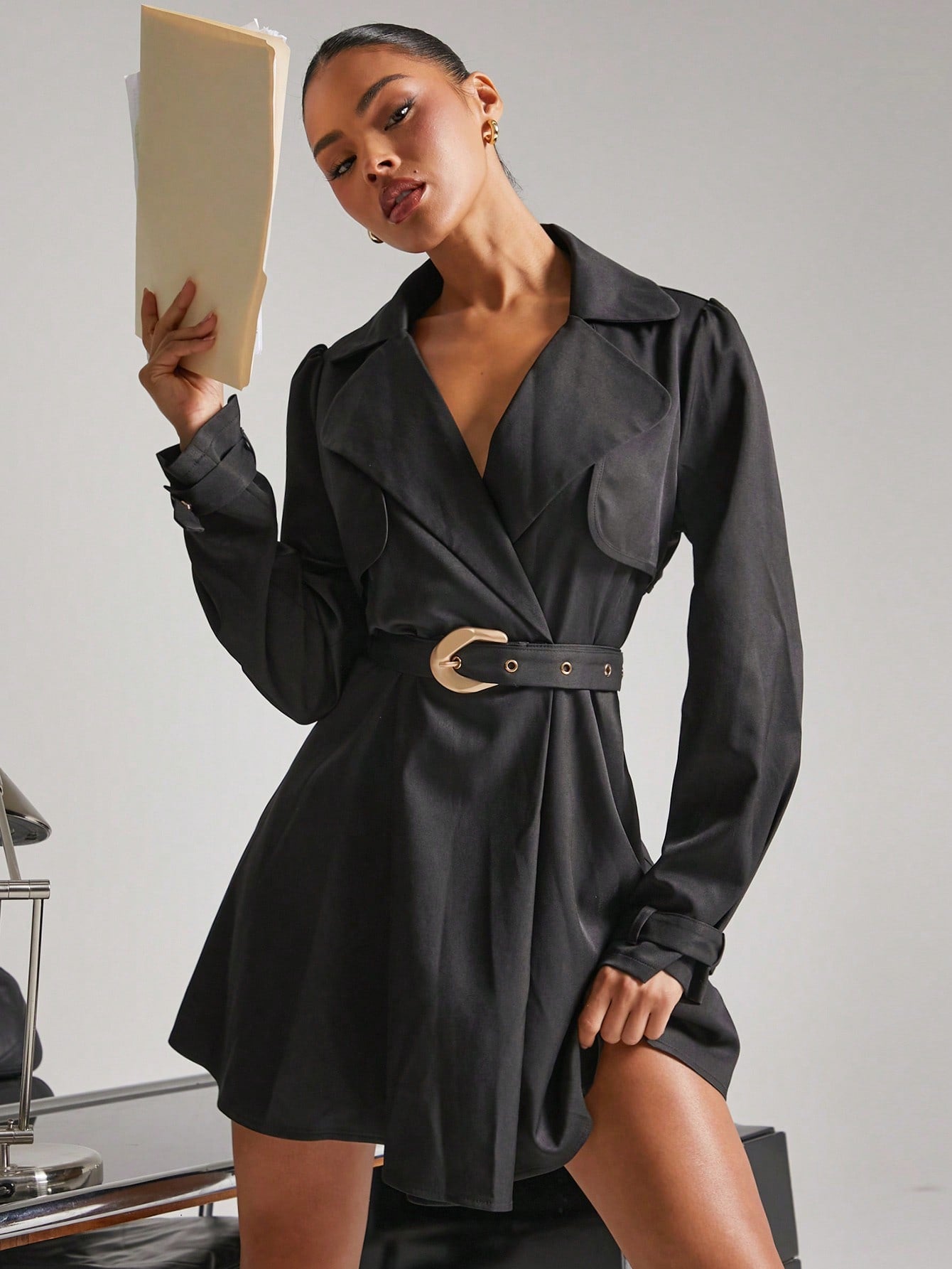 Step out in style with this Elegant Black Lapel Mini Dress, designed to turn heads at parties, concerts, or any day you want to feel fabulous. The flattering lapel and waist-defining belt add a chic touch, while the winter-ready fabric keeps you cozy. Whether you're dancing the night away or strolling through the city, this dress makes everyday fashion effortlessly fun.