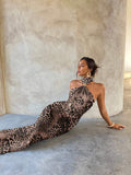 Leopard print bodycon maxi dress with asymmetric halter neck and gold front ring