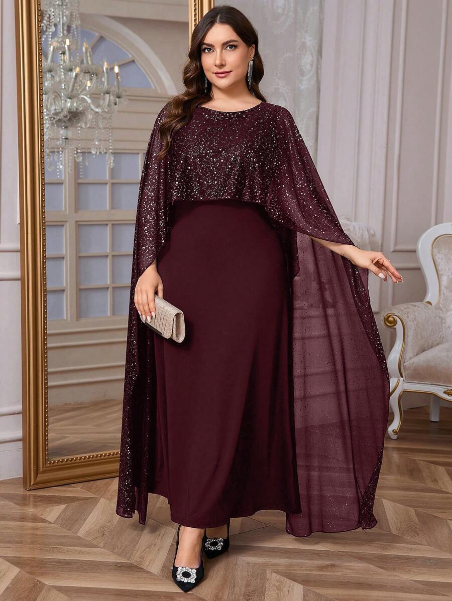 Make a statement in this stunning black maxi dress that effortlessly transitions from day to night. The flowing silhouette pairs beautifully with a shimmering cape that catches the light with every move, adding drama and sophistication to your look. Whether you're heading to a cocktail party, jetting off on vacation, or enjoying an intimate dinner date, this versatile piece delivers elegance with a touch of glamour. The timeless black palette ensures it works with everything in your wardrobe, while the luxe