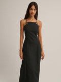 Slip into timeless elegance with this stunning black maxi dress that's equal parts sophisticated and fun. Delicate spaghetti straps frame the neckline while the show-stopping vintage crisscross back design adds an unexpected twist of allure. Perfect for fall and winter occasions, this dress transitions effortlessly from evening events to upscale casual outings. The flowing silhouette flatters every figure, making you feel confident and fabulous. Whether you're heading to a dinner date or a night out with fr