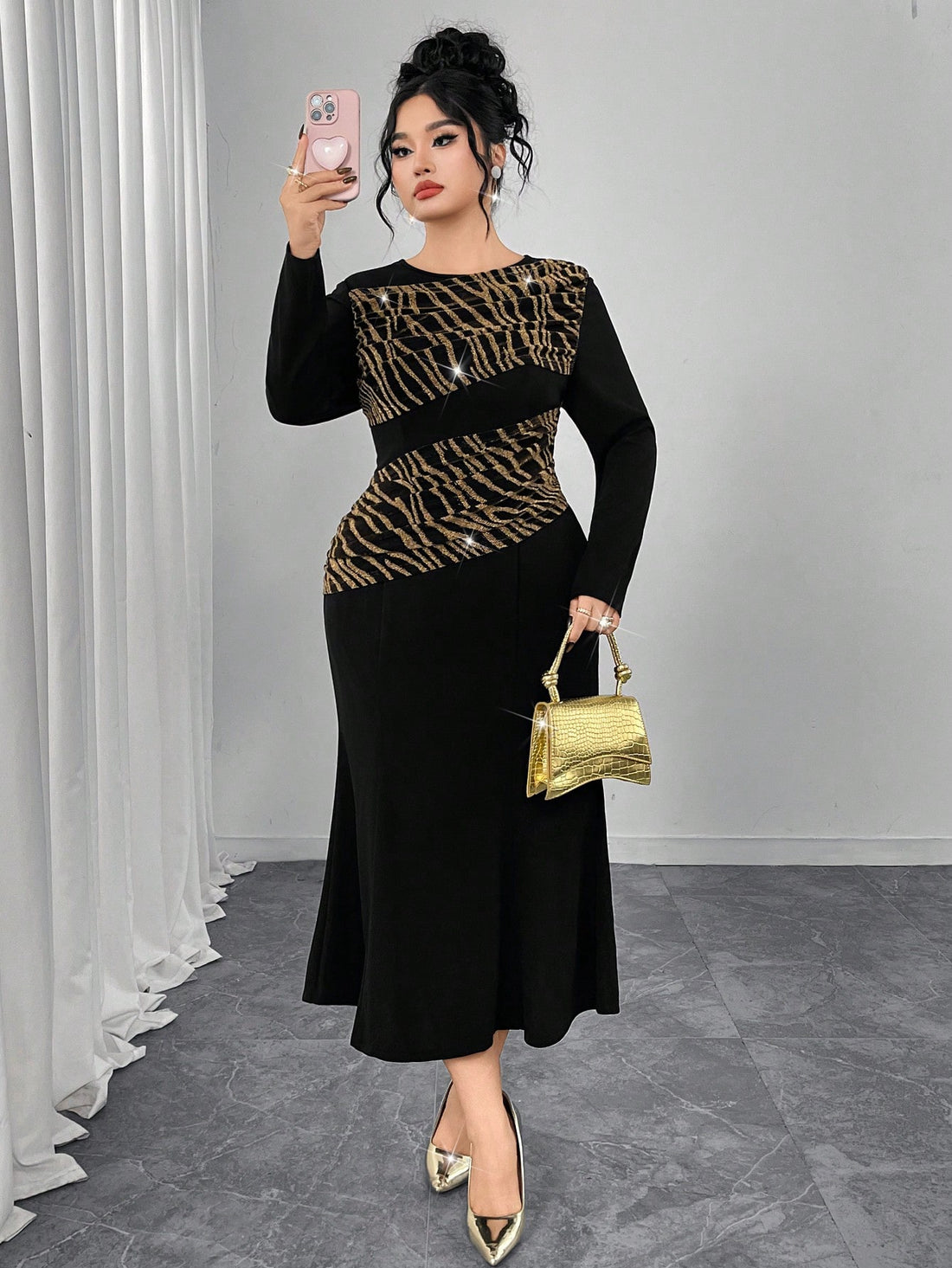 Make waves in this stunning mermaid dress that blends timeless elegance with bold animal print flair. The sleek black silhouette features eye-catching gold and brown zebra stripes, while long sleeves with a clever splice design add modern sophistication. Perfect for turning heads at special events, date nights, or whenever you want to channel your inner siren. This dress combines classic mermaid tailoring with playful print details for a look that's undeniably unforgettable.