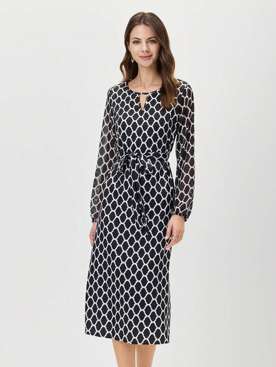 Stay classy and comfortable in our Elegant Black Midi Dress. Perfect for teachers and business casual attire, this dress exudes professionalism and style. Don't sacrifice fashion for function with this versatile and chic piece.