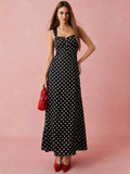 Introducing your new go-to for romantic dates, vacations, and summer style - the Elegant Black Polka Dot Print Long Dress! With its wide straps and timeless polka dot print, this dress is perfect for any occasion. Look elegant and chic while feeling comfortable in this must-have dress.