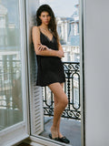 Slip into sophistication with this chic black satin mini dress, where luxe fabric meets delicate lace trim for an effortlessly glamorous look. The sleek silhouette flatters every frame, while the satin sheen catches the light just right—whether you're heading to dinner, drinks, or dancing. Lightweight enough for layering under jackets, yet polished enough to stand alone. Your go-to piece for turning heads all season long.