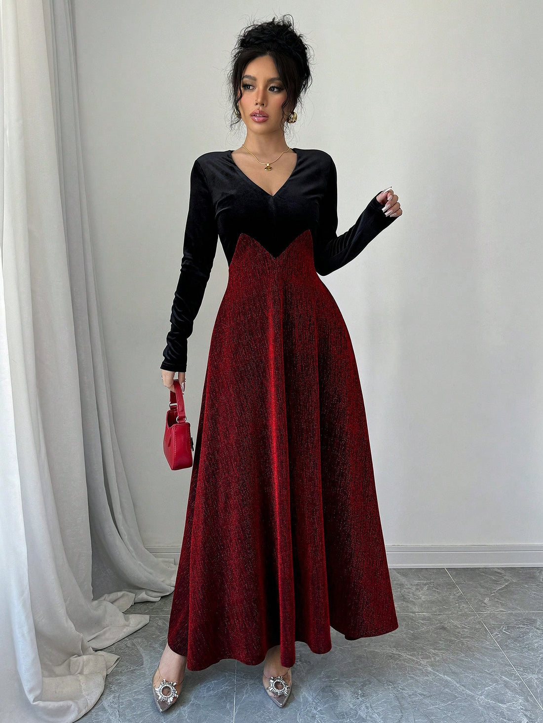 Get ready to turn heads with this Elegant Black Velvet A-Line Dress! Adorned with shimmering silver thread, this dress is perfect for any glamorous evening event. Its flattering A-line shape will have you feeling confident and stylish, making it a must-have in your wardrobe. Perfect for those who love to make a statement.